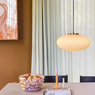 Dining room with a table, chairs, and decorative items.